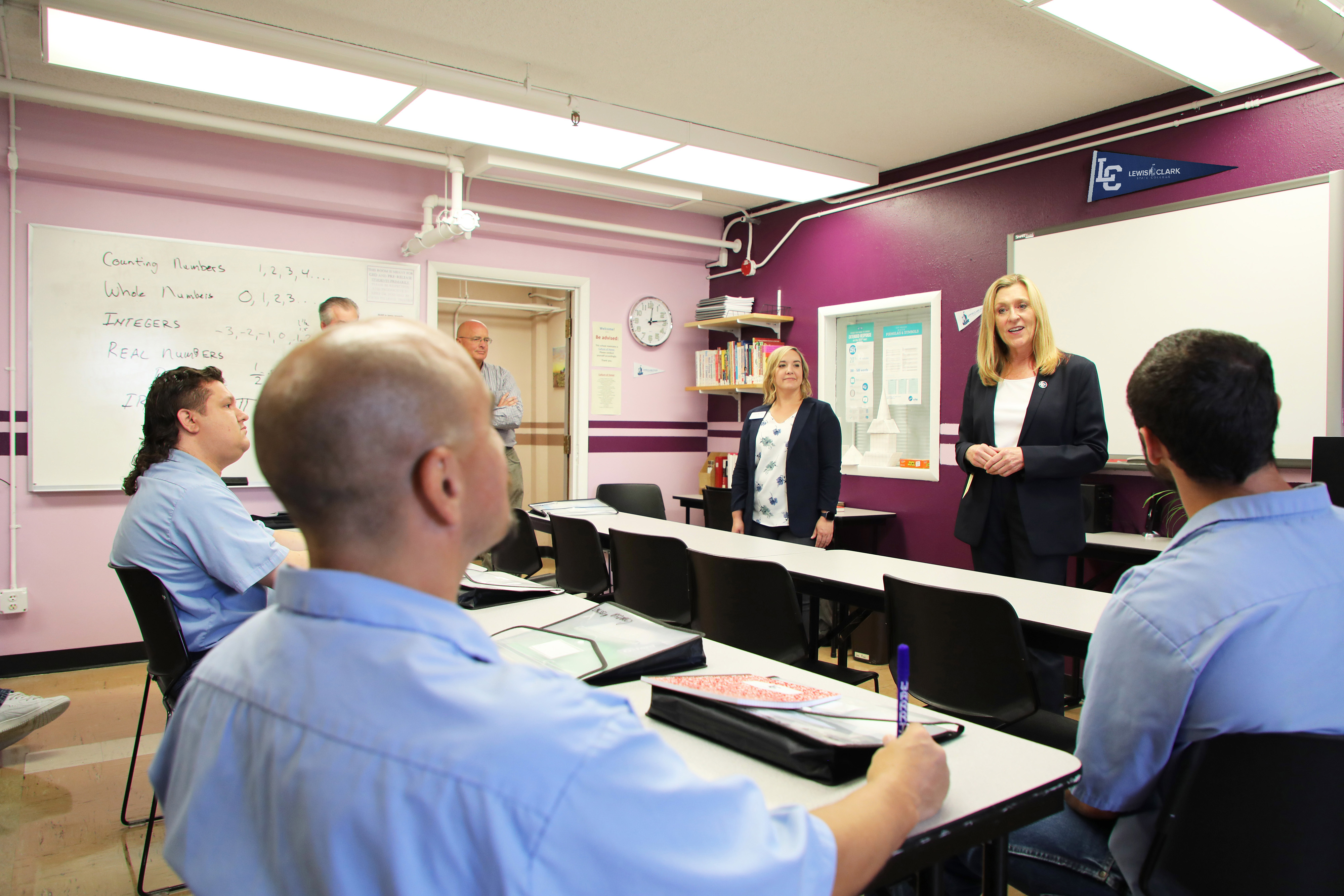 President Pemberton welcoming a group of students on first day