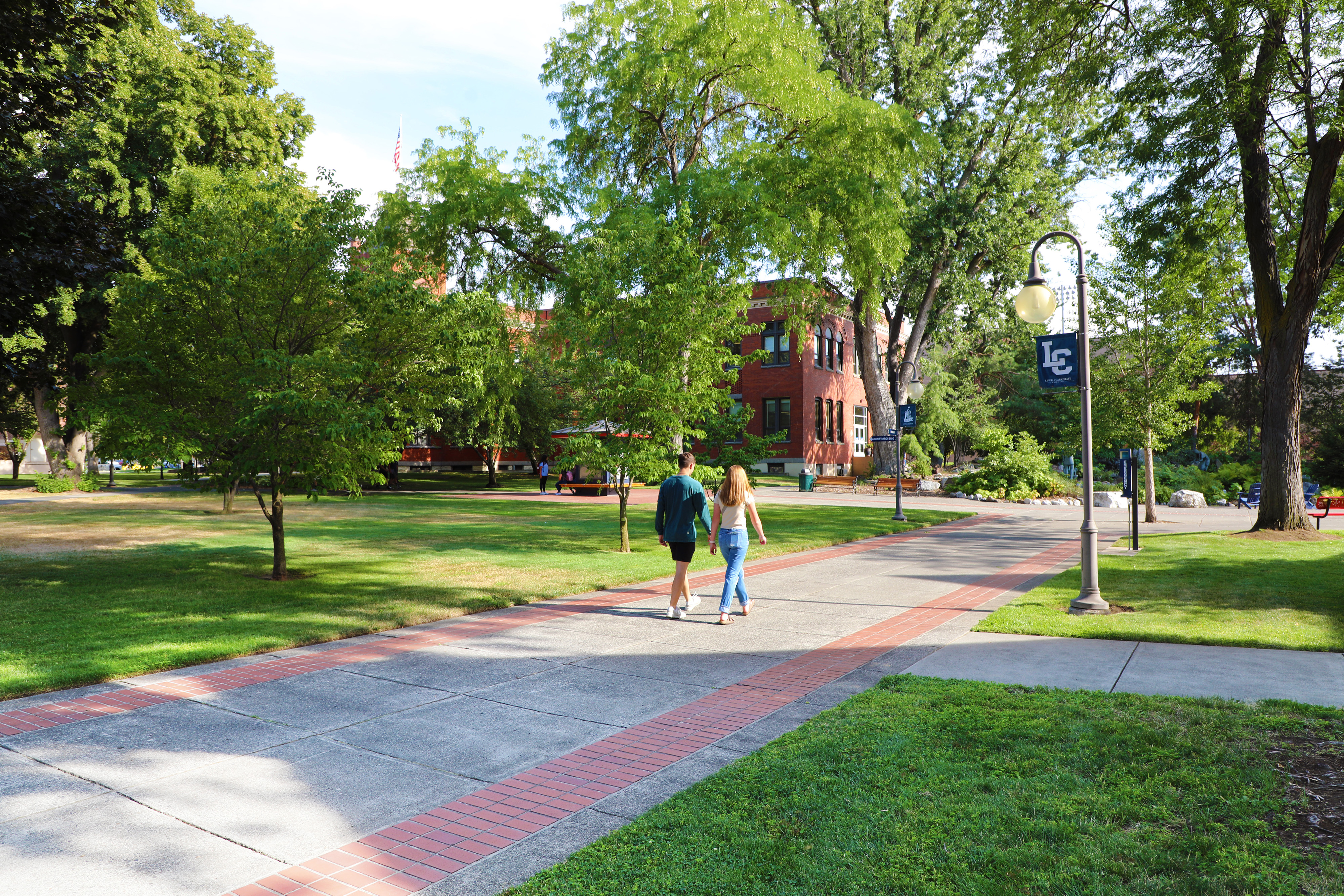 Students Walking On Campus In The Fall