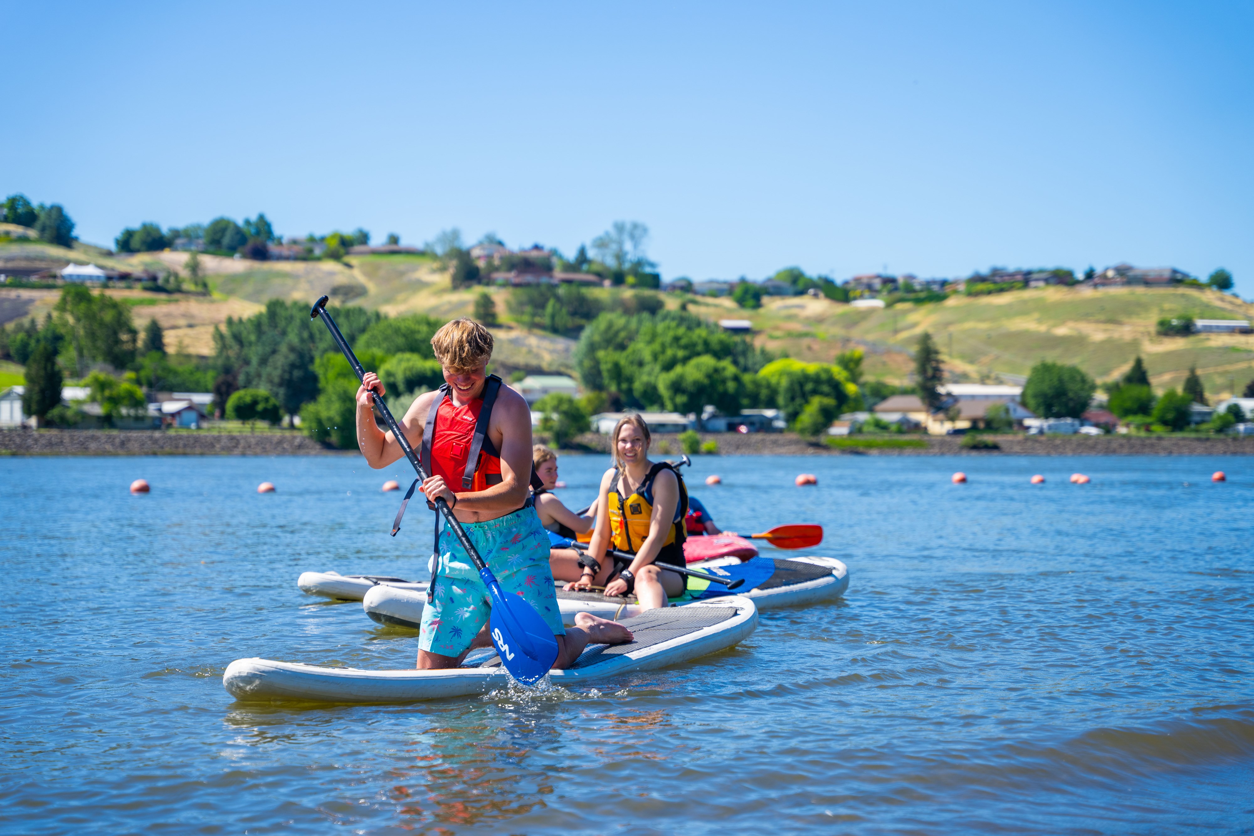 LC student paddleboarding