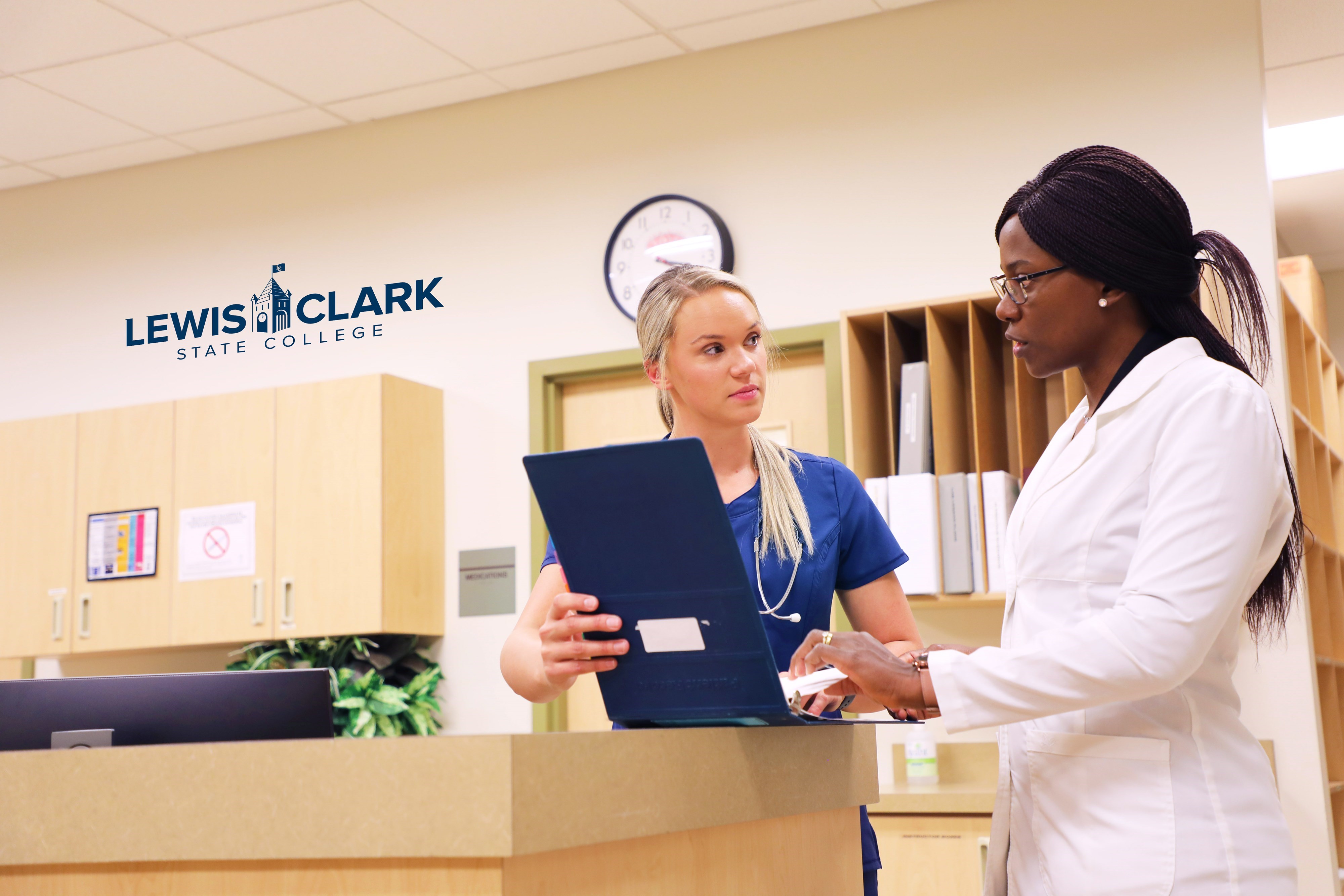 Nursing student and staff talking