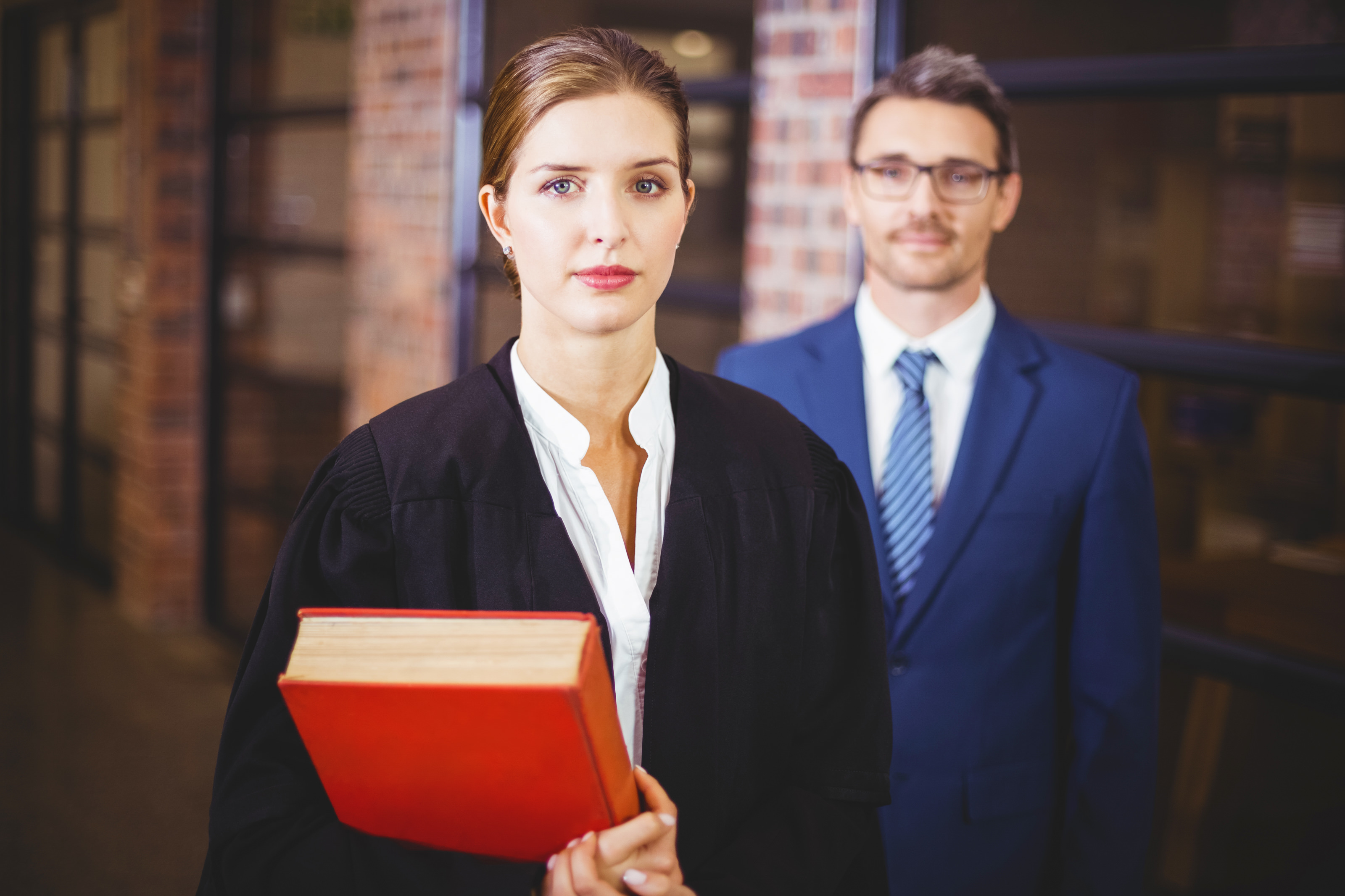 Female law student with book in hand