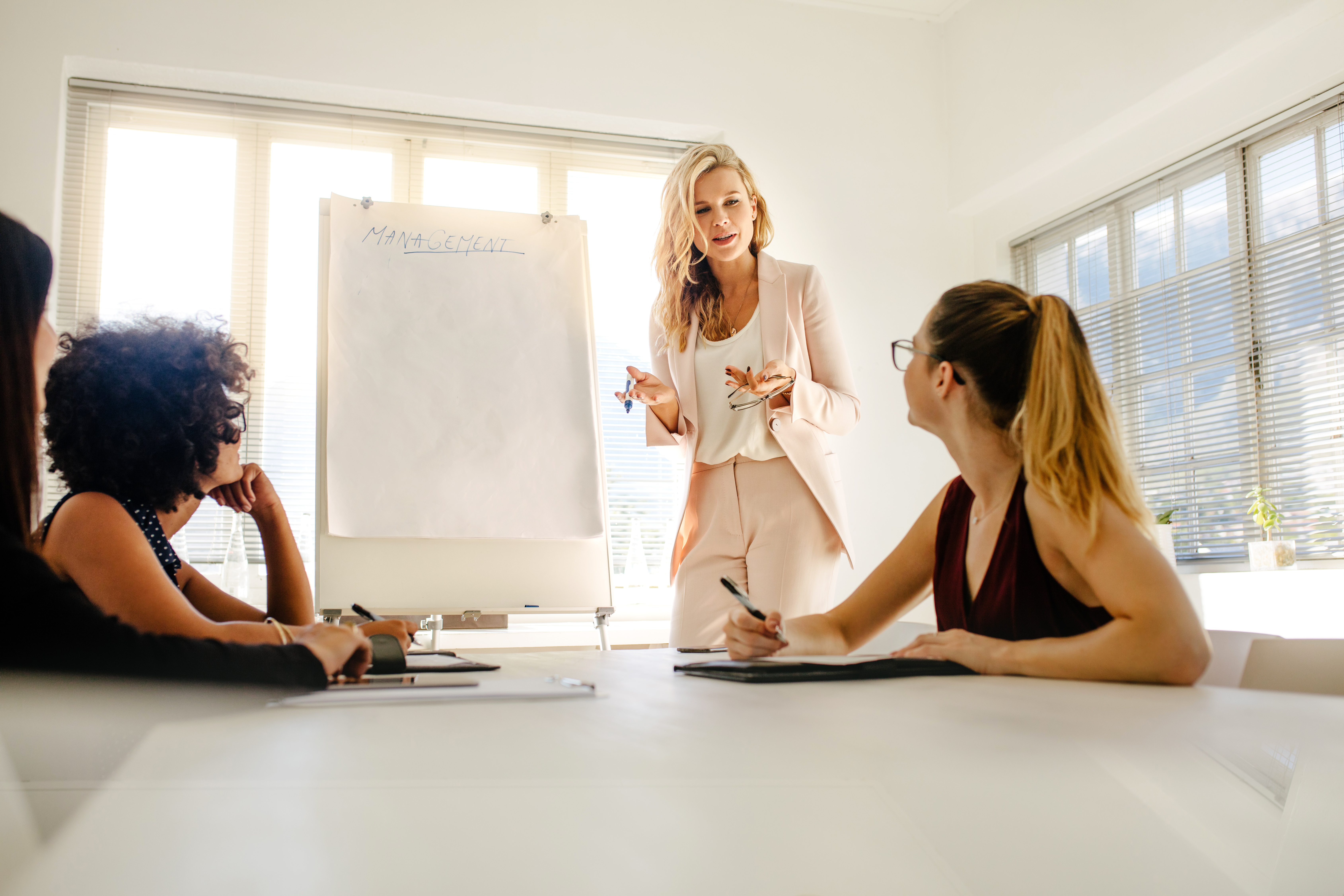 Female manager giving business presentation