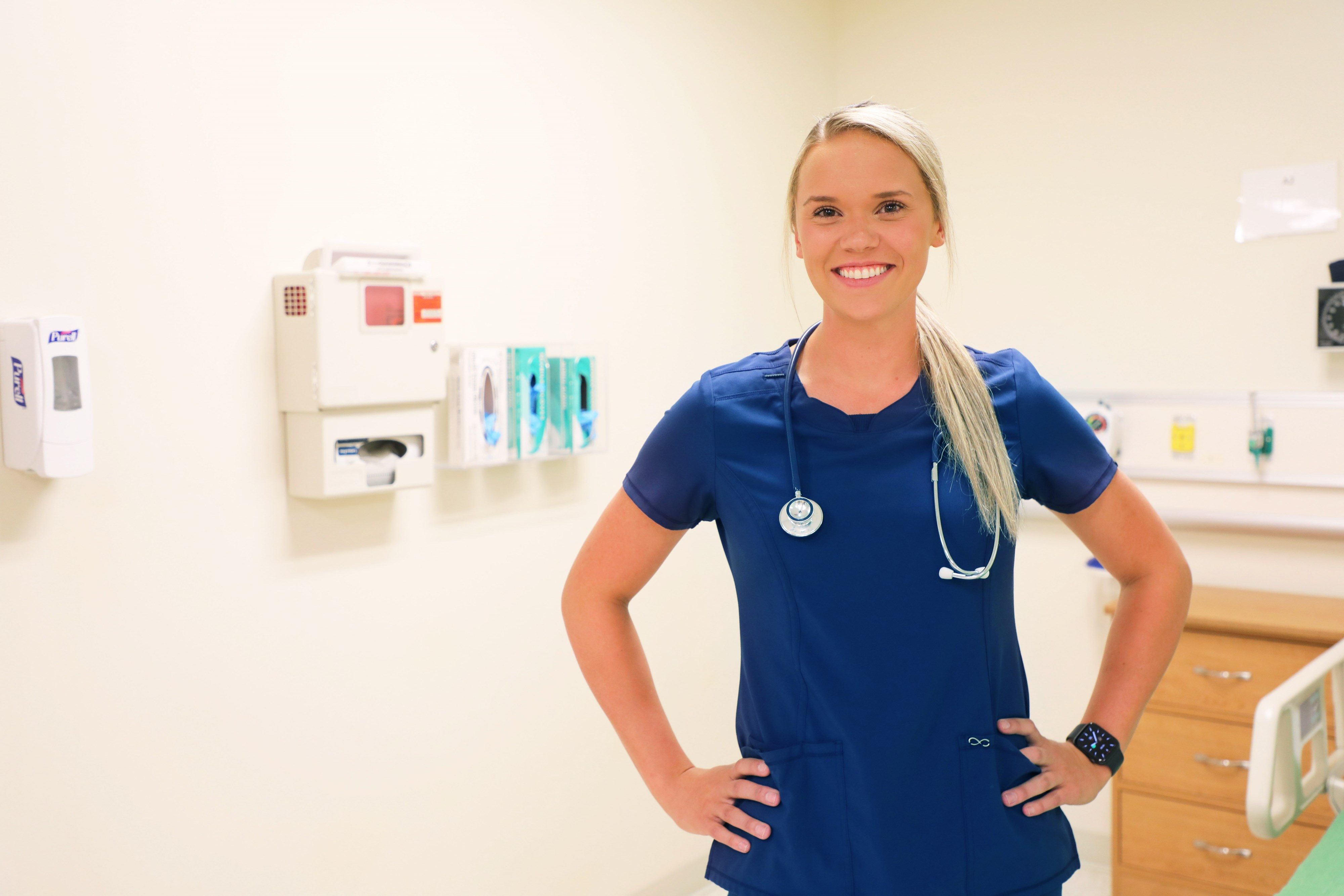 Female nurse smiling at camera