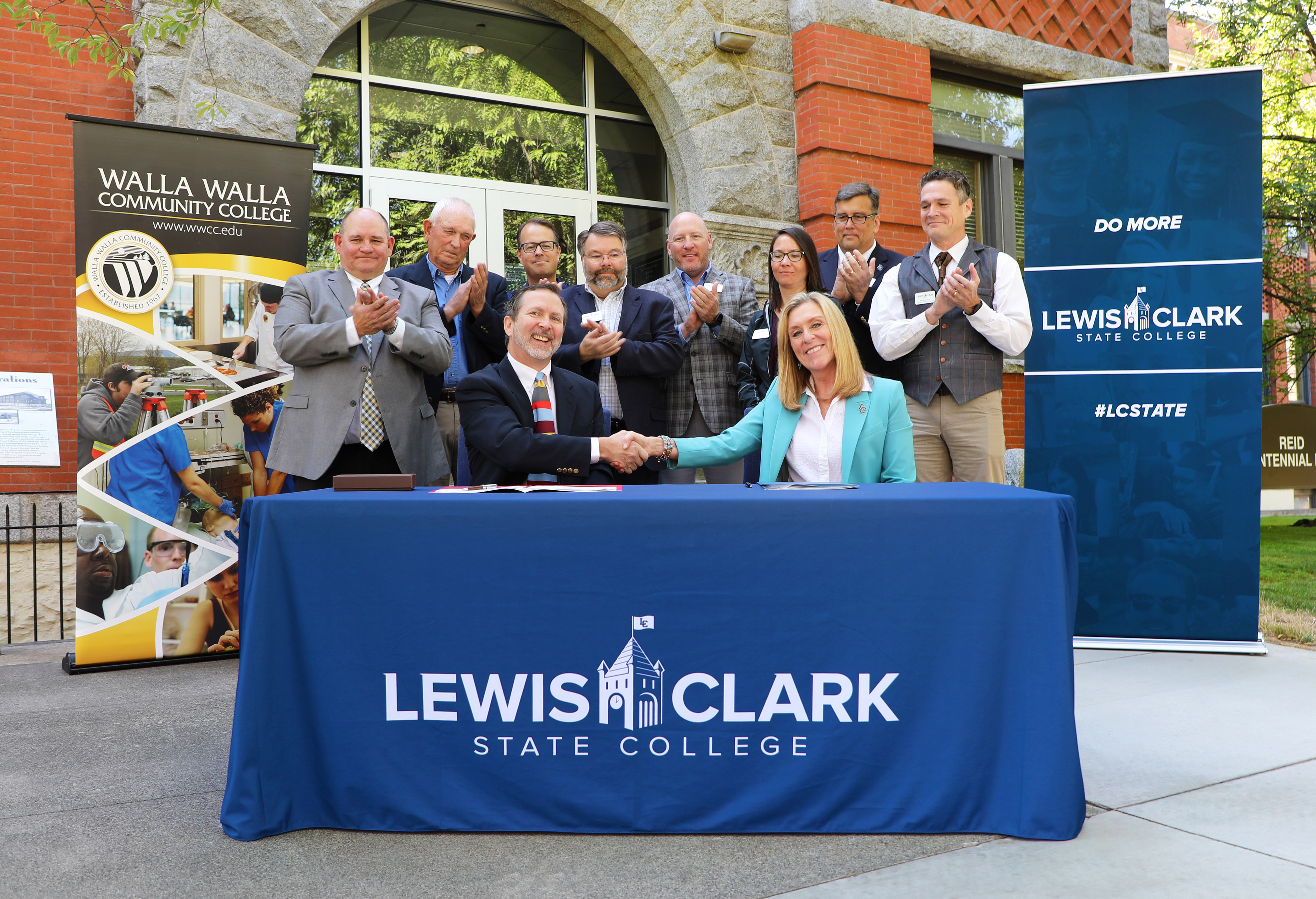 LC State and WWCC administrators sign MOU in front of Reid Hall