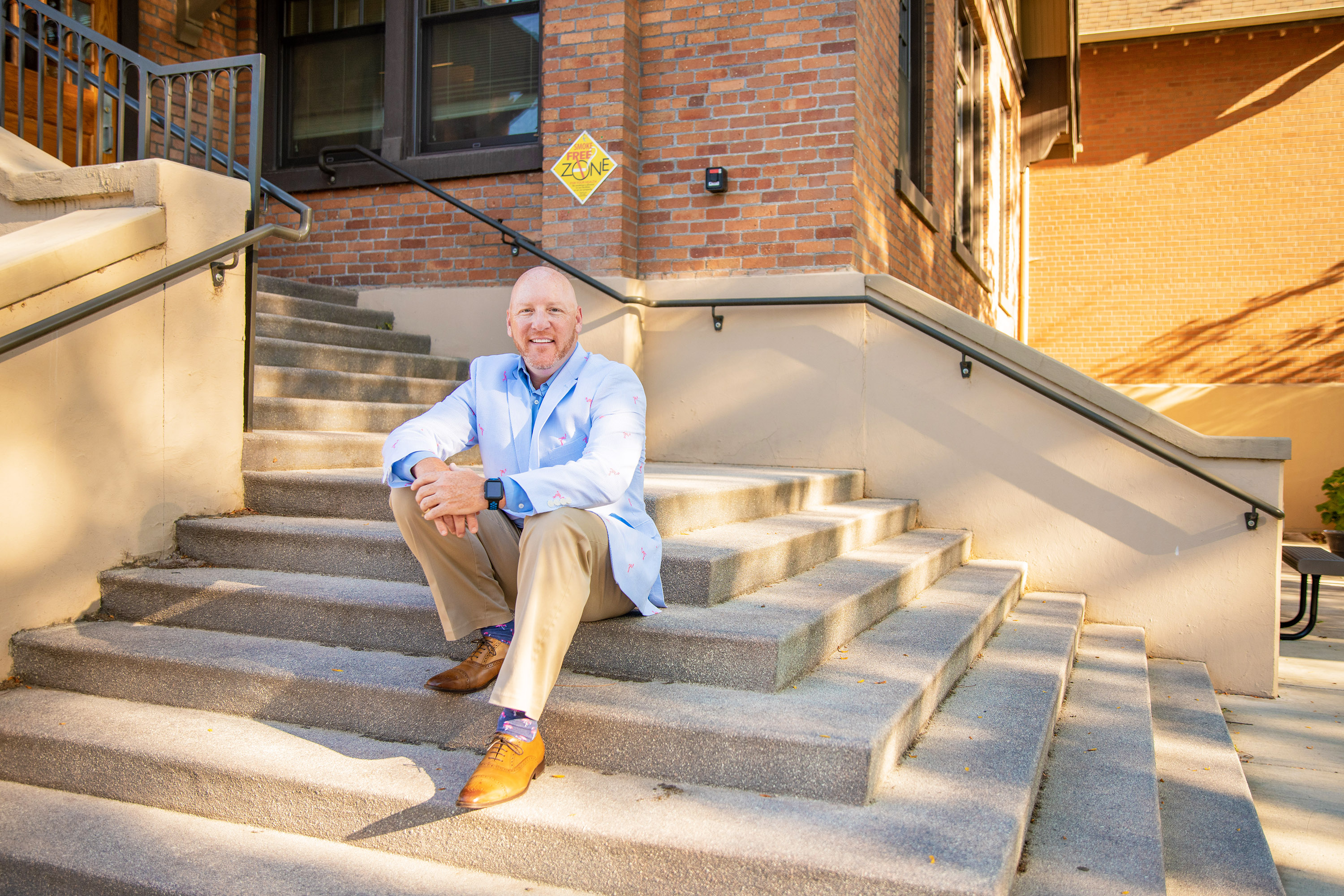 Fred Chilson seated in front of Thomas Jefferson Hall